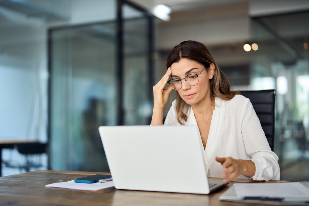 A menopausal women suffering from peri-menopause symptoms looking tired